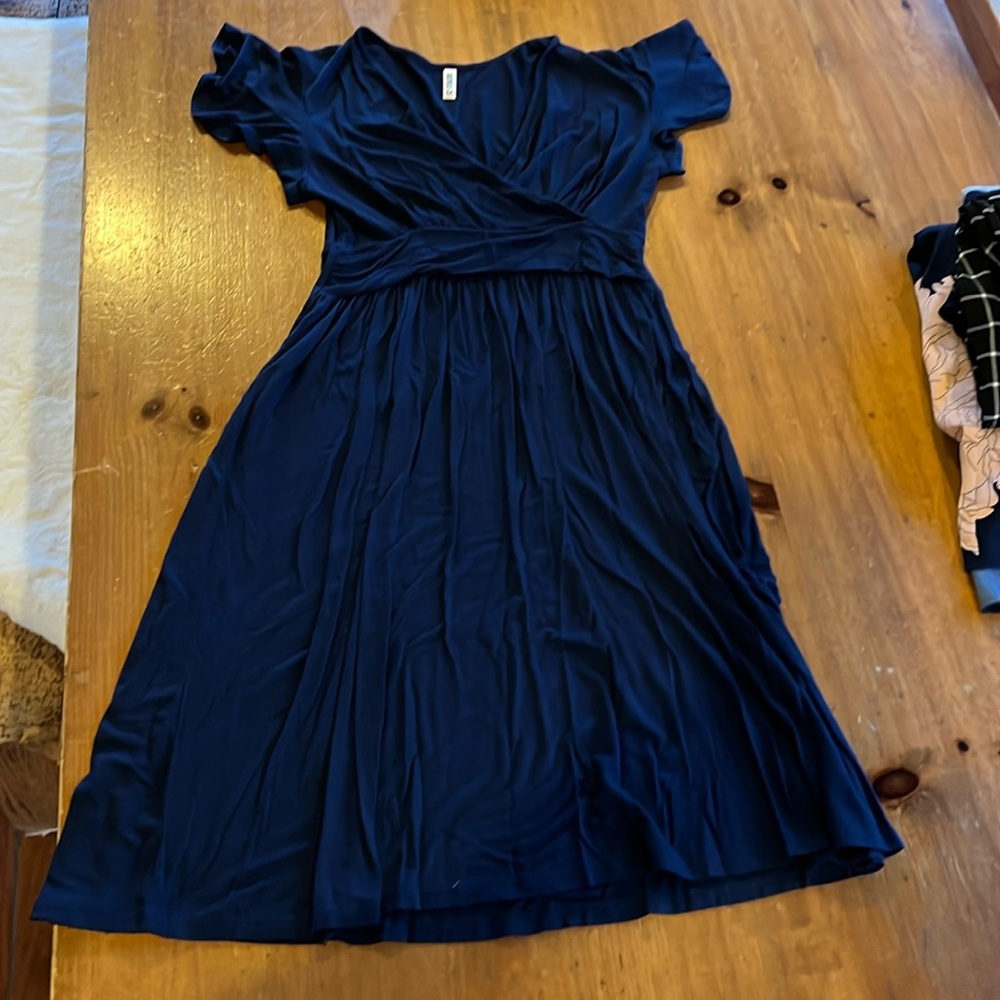 Navy blue shortsleeved Rayon dress. Size medium